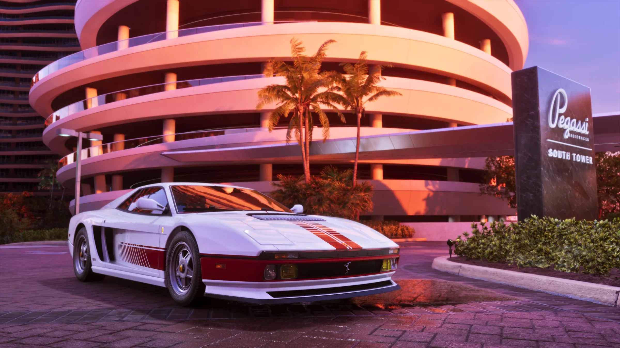 A white sports car parked outside the Pegassi Residences at sunset